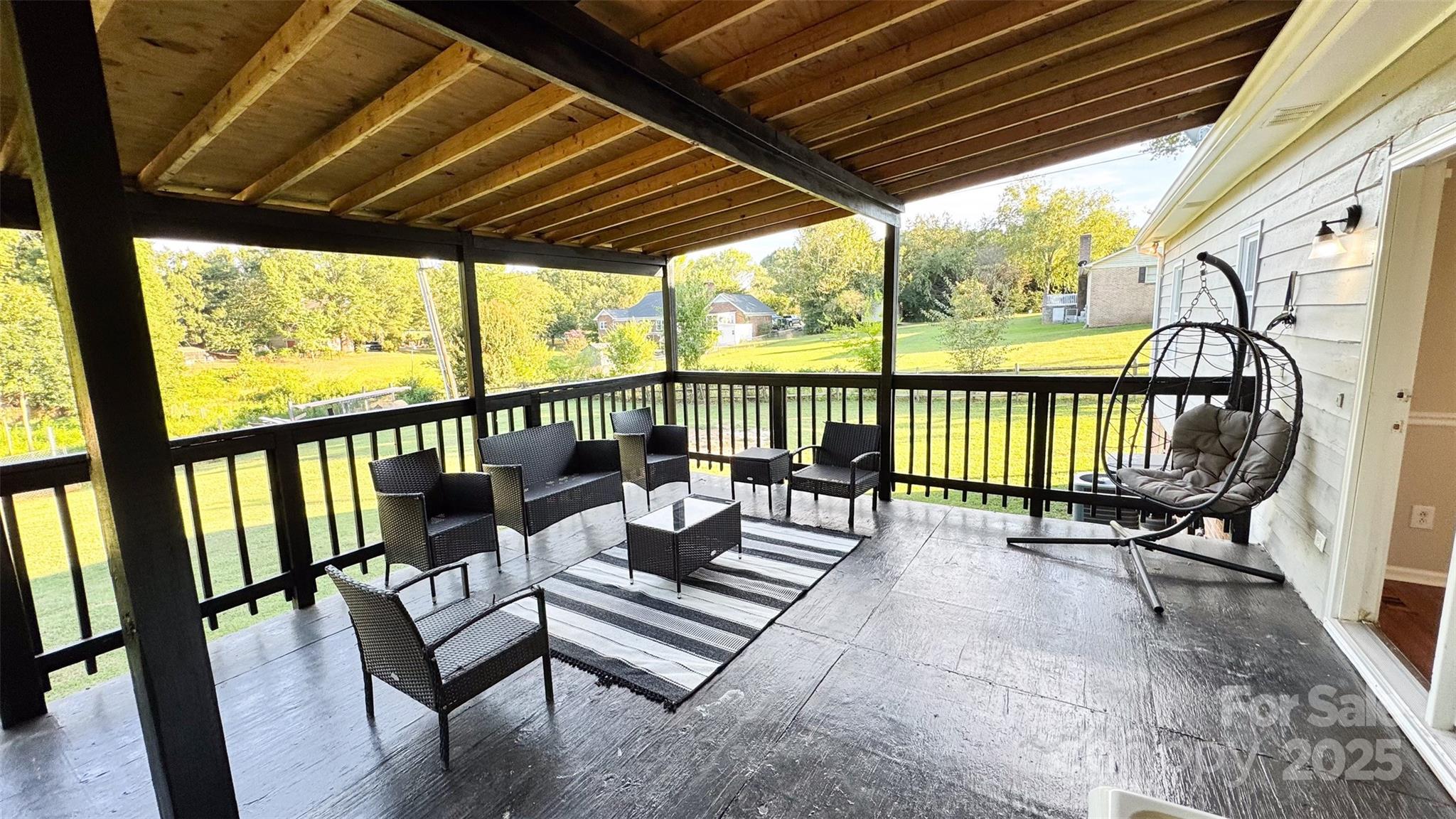 3014 Morgan Mill Road Monroe, NC 28110 - Photo 6 of 26 a view of a two chairs in the roof deck