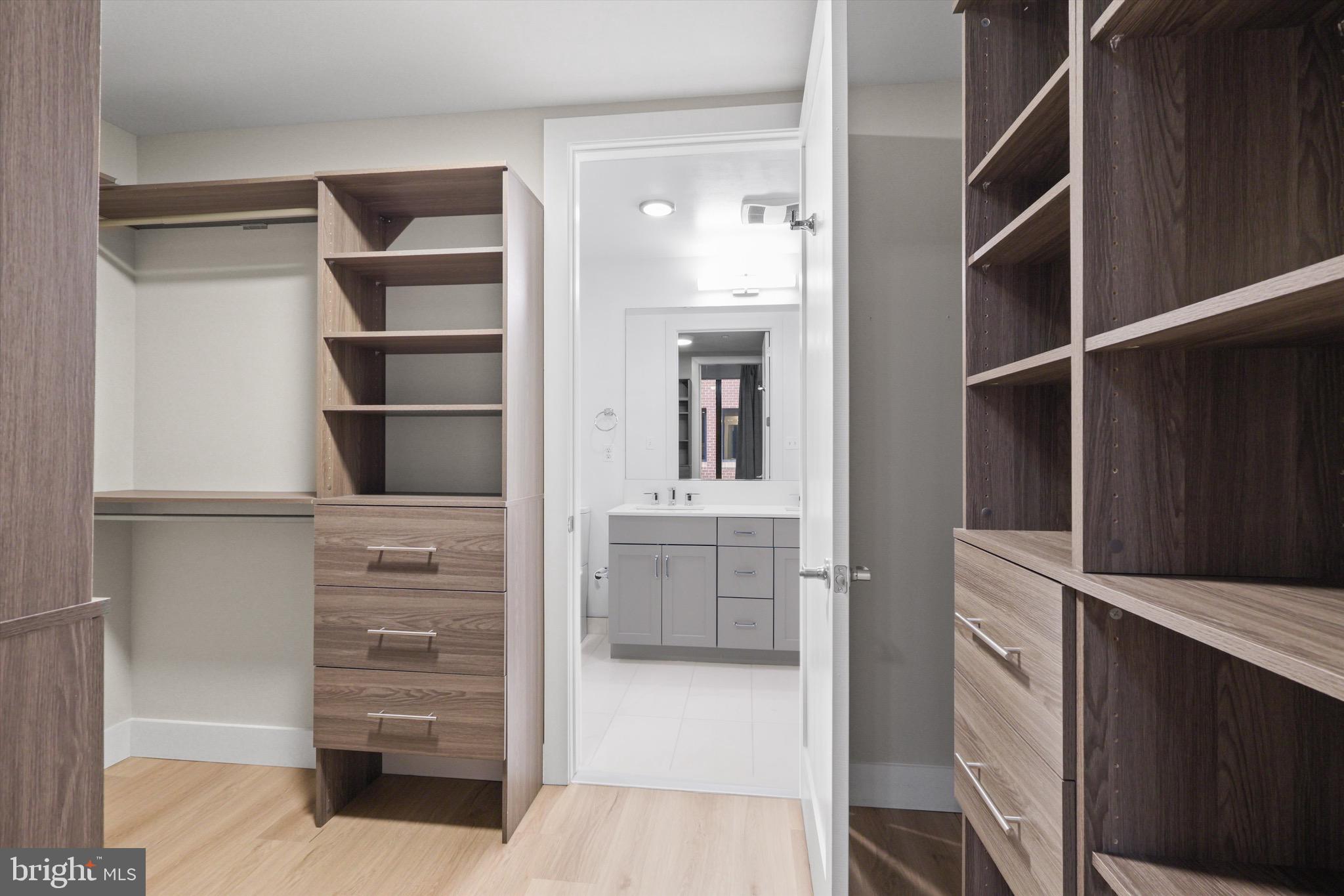 801 North Fairfax Street, Unit 318 Alexandria, VA 22314 - Photo 11 of 26 a view of walk in closet and bedroom view