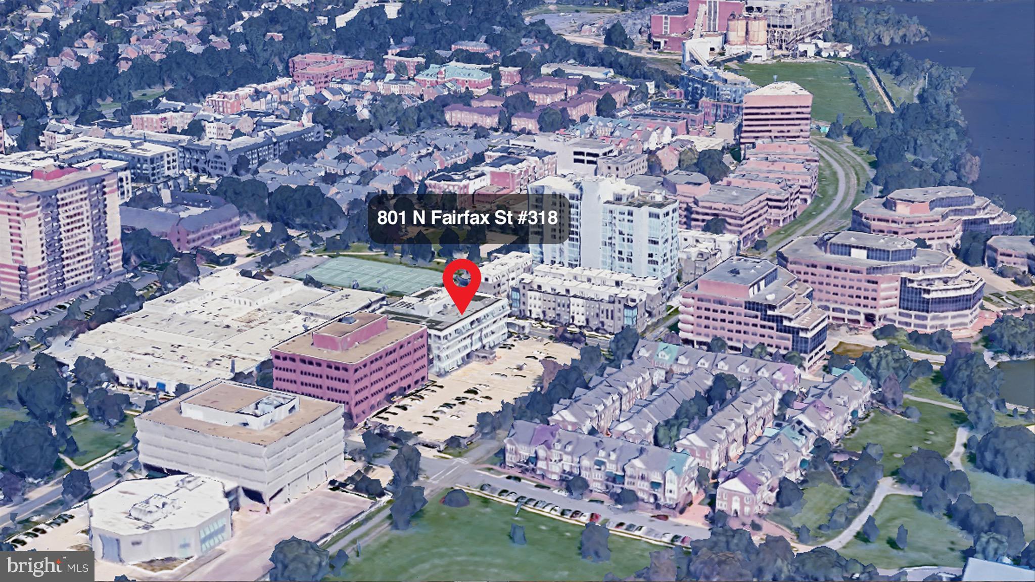 801 North Fairfax Street, Unit 318 Alexandria, VA 22314 - Photo 23 of 26 an aerial view of a house with a yard