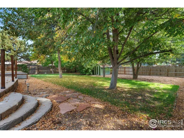 a view of a garden with trees