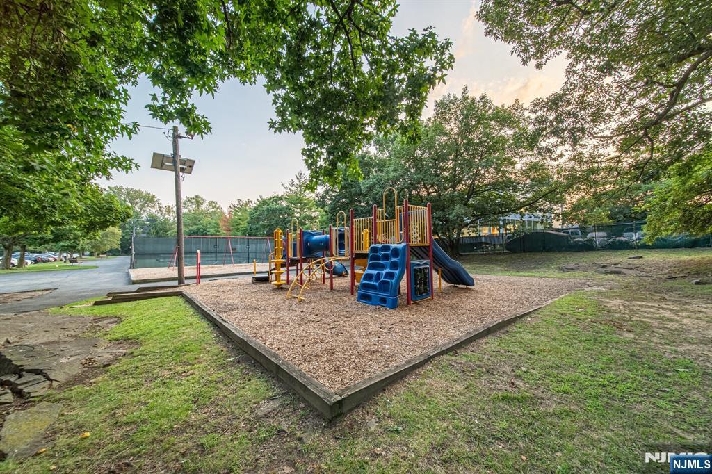 6 Horizon Road, Unit 906 Fort Lee, NJ 07024 - Photo 8 of 12 a view of a backyard with swimming pool