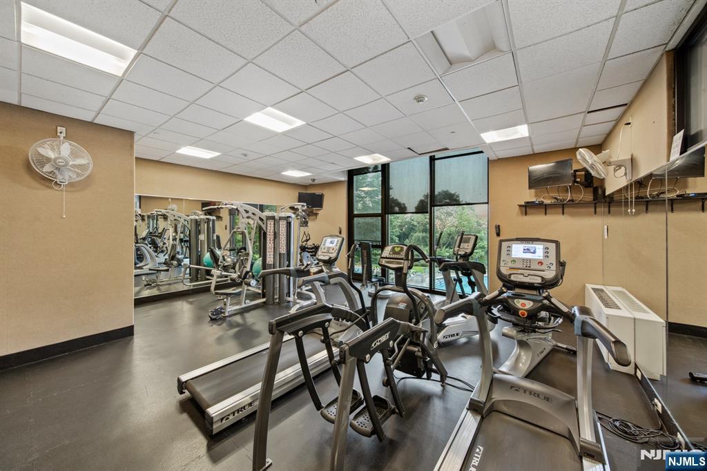 6 Horizon Road, Unit 906 Fort Lee, NJ 07024 - Photo 9 of 12 a view of a room with gym equipment