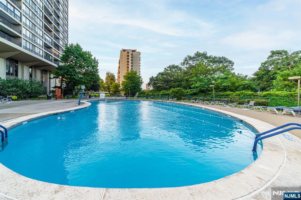 6 Horizon Road, Unit 906 Fort Lee, NJ 07024 - Photo 10 of 12 a view of a swimming pool with an outdoor space