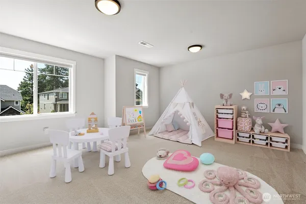 a bedroom with furniture and a window