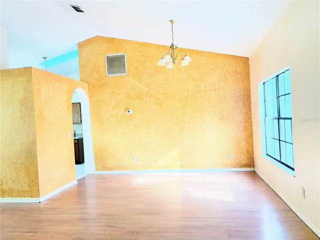 a view of a big room with wooden floor