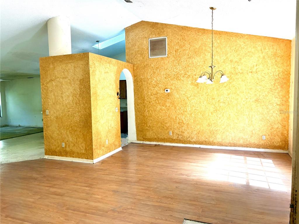 795 Scooter Point Geneva, FL 32732 - Photo 5 of 12 a view of a big room with wooden floor