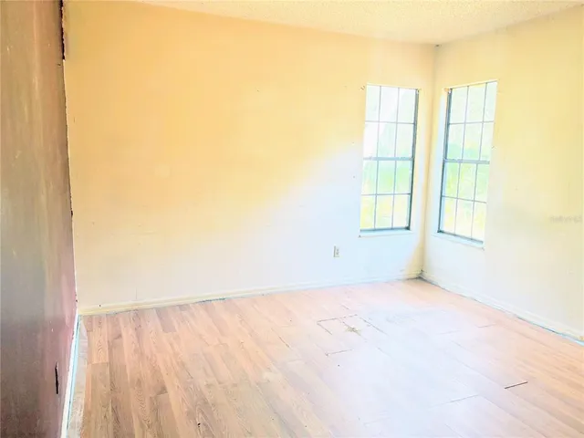 a view of an empty room and window