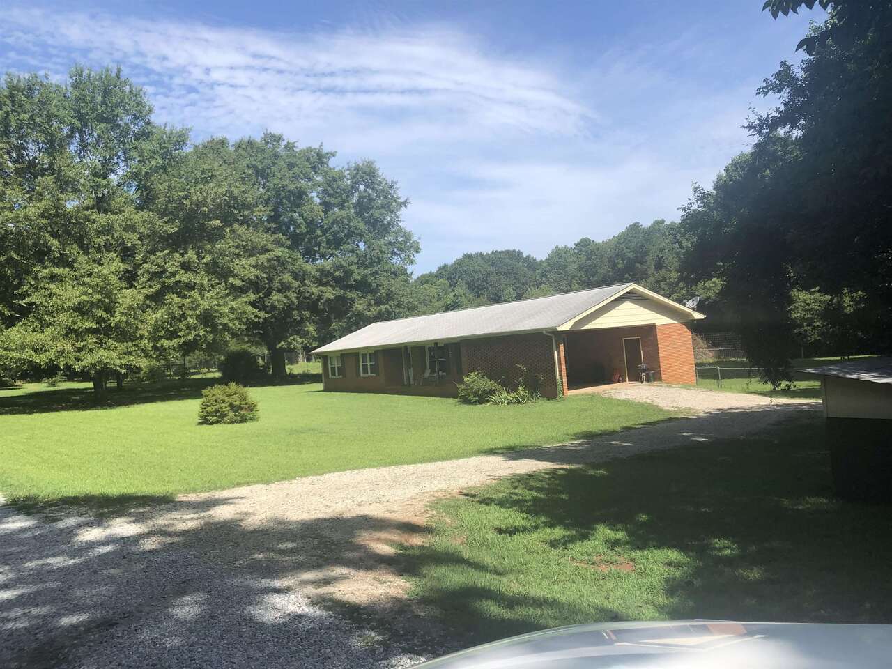 2434 Cane Creek Road Athens, GA 30607 - Photo 1 of 1 a front view of a house with a yard
