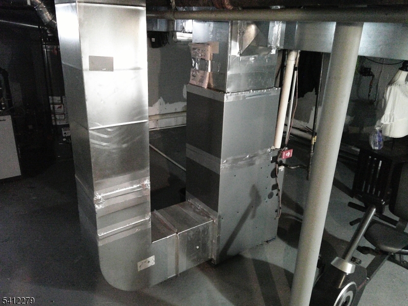 220 Terrill Road Plainfield, NJ 07062 - Photo 11 of 15 a refrigerator freezer sitting inside of a kitchen