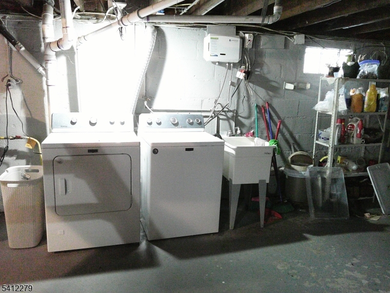 220 Terrill Road Plainfield, NJ 07062 - Photo 12 of 15 a utility room with dryer and washer