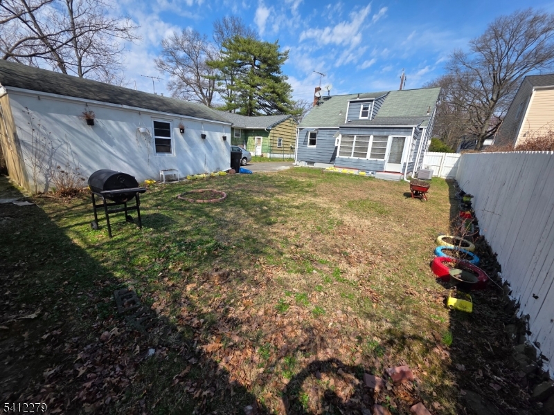 220 Terrill Road Plainfield, NJ 07062 - Photo 15 of 15 a house view with a garden space