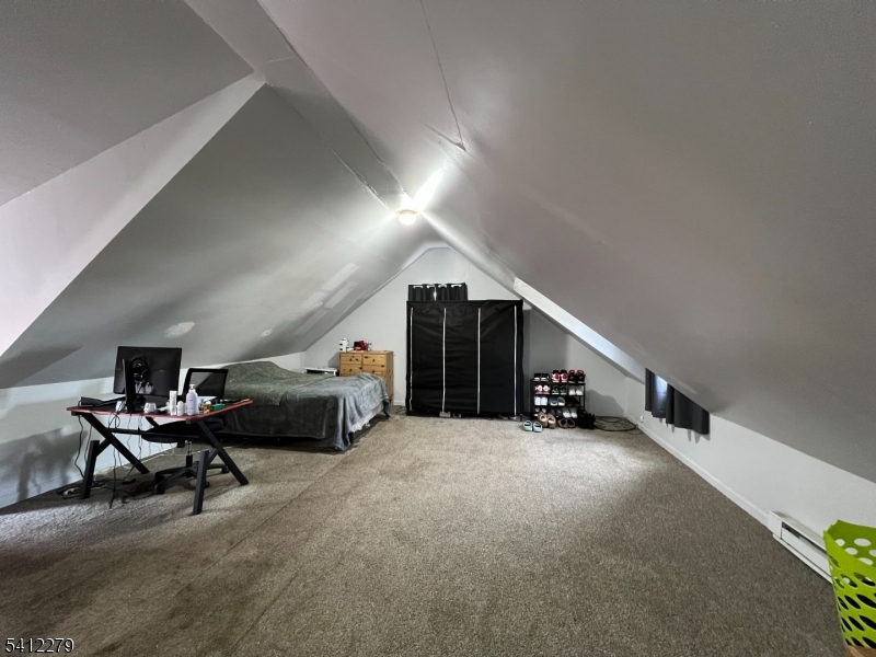 220 Terrill Road Plainfield, NJ 07062 - Photo 10 of 15 a view of a livingroom with furniture and a window