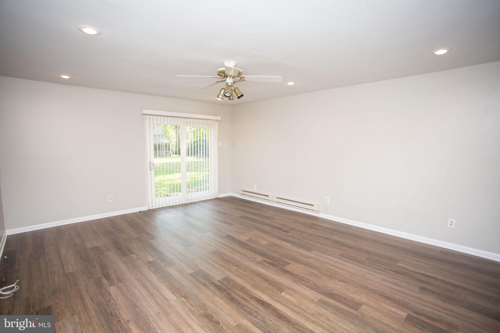1016 Eagle Lane Cherry Hill, NJ 08003 - Photo 20 of 54 wooden floor in an empty room with a window