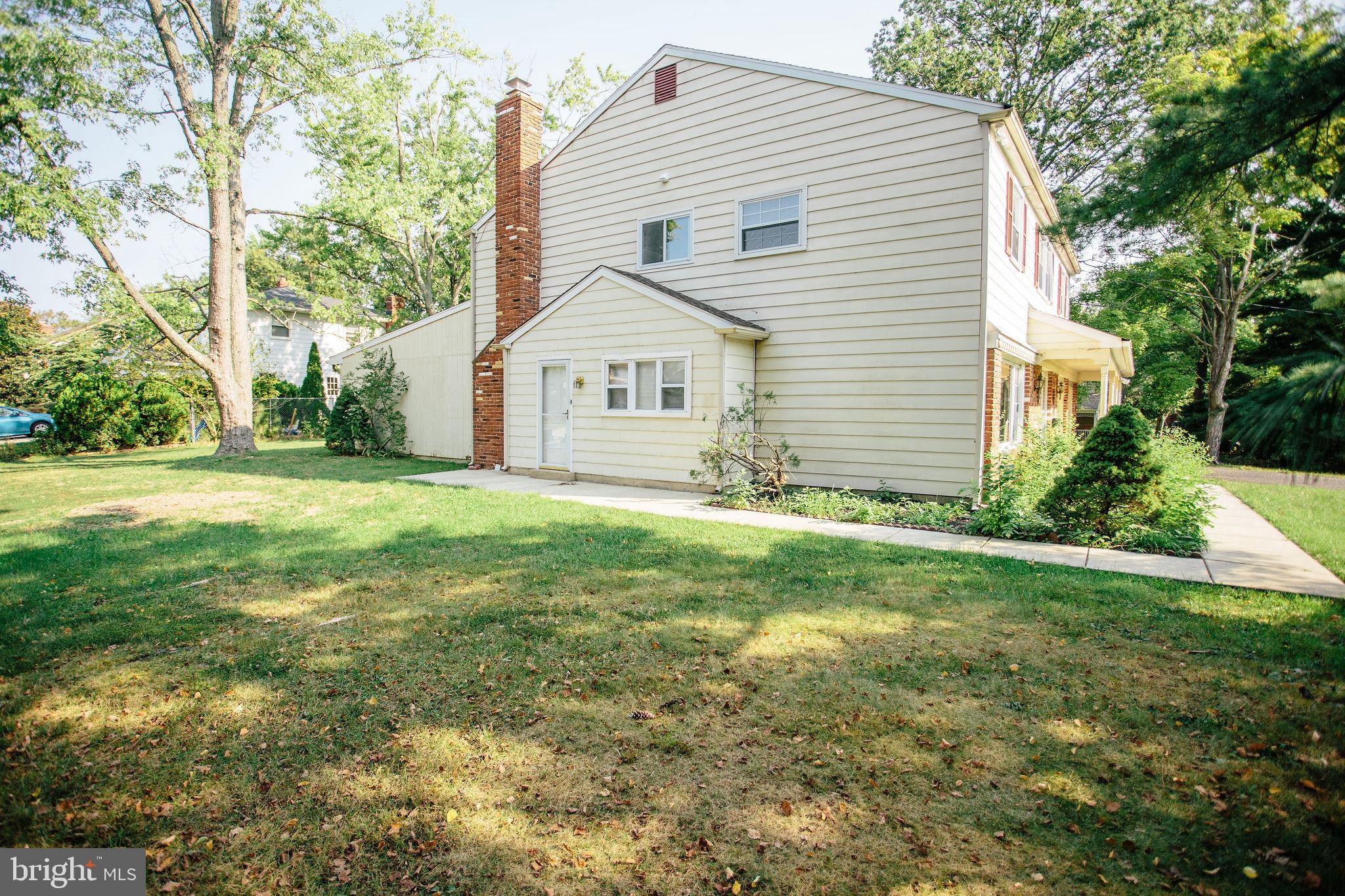1016 Eagle Lane Cherry Hill, NJ 08003 - Photo 2 of 54 a view of a house with a yard