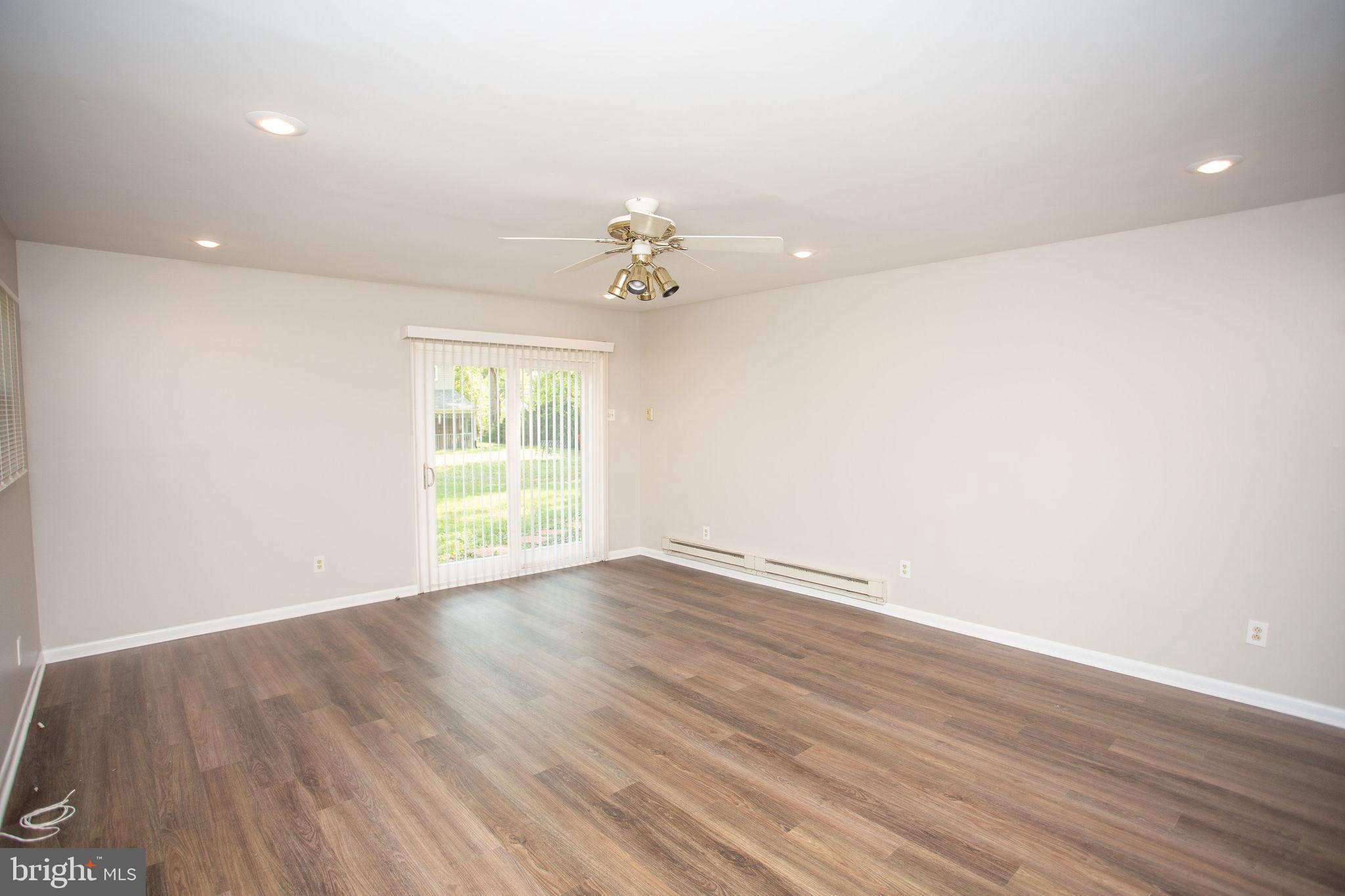 1016 Eagle Lane Cherry Hill, NJ 08003 - Photo 24 of 54 wooden floor in an empty room with a window