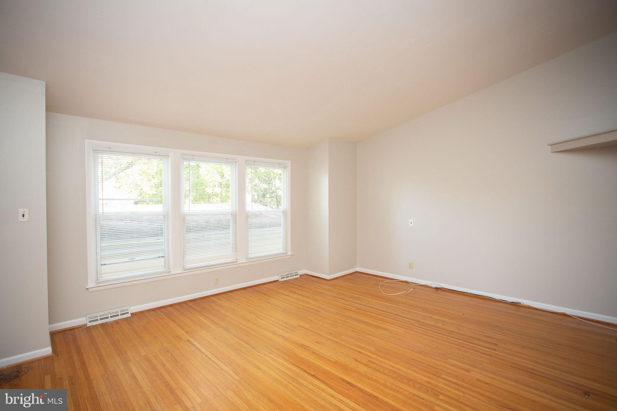 1016 Eagle Lane Cherry Hill, NJ 08003 - Photo 28 of 54 a view of empty room with wooden floor and fan