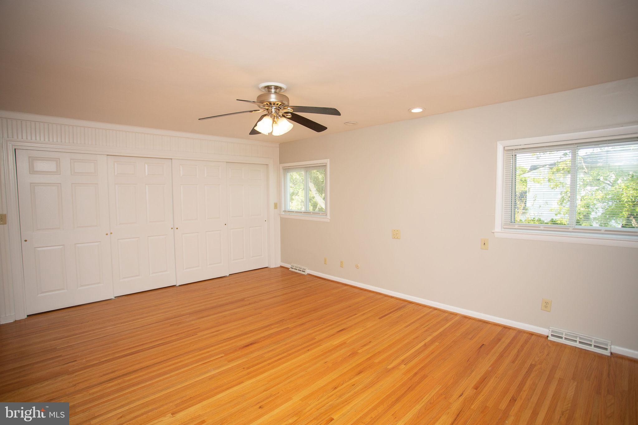 1016 Eagle Lane Cherry Hill, NJ 08003 - Photo 33 of 54 wooden floor in an empty room with a window