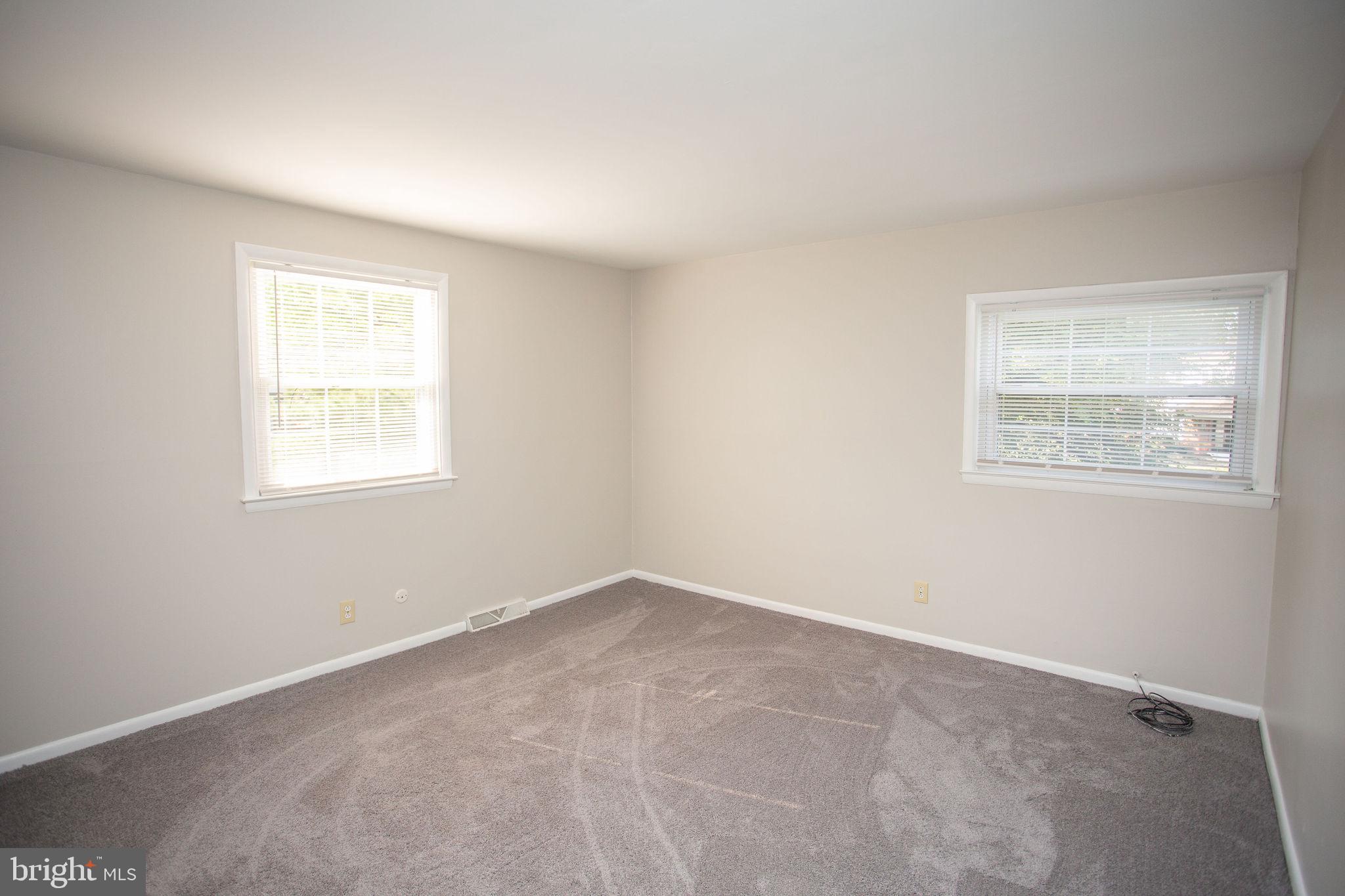 1016 Eagle Lane Cherry Hill, NJ 08003 - Photo 40 of 54 an empty room with windows