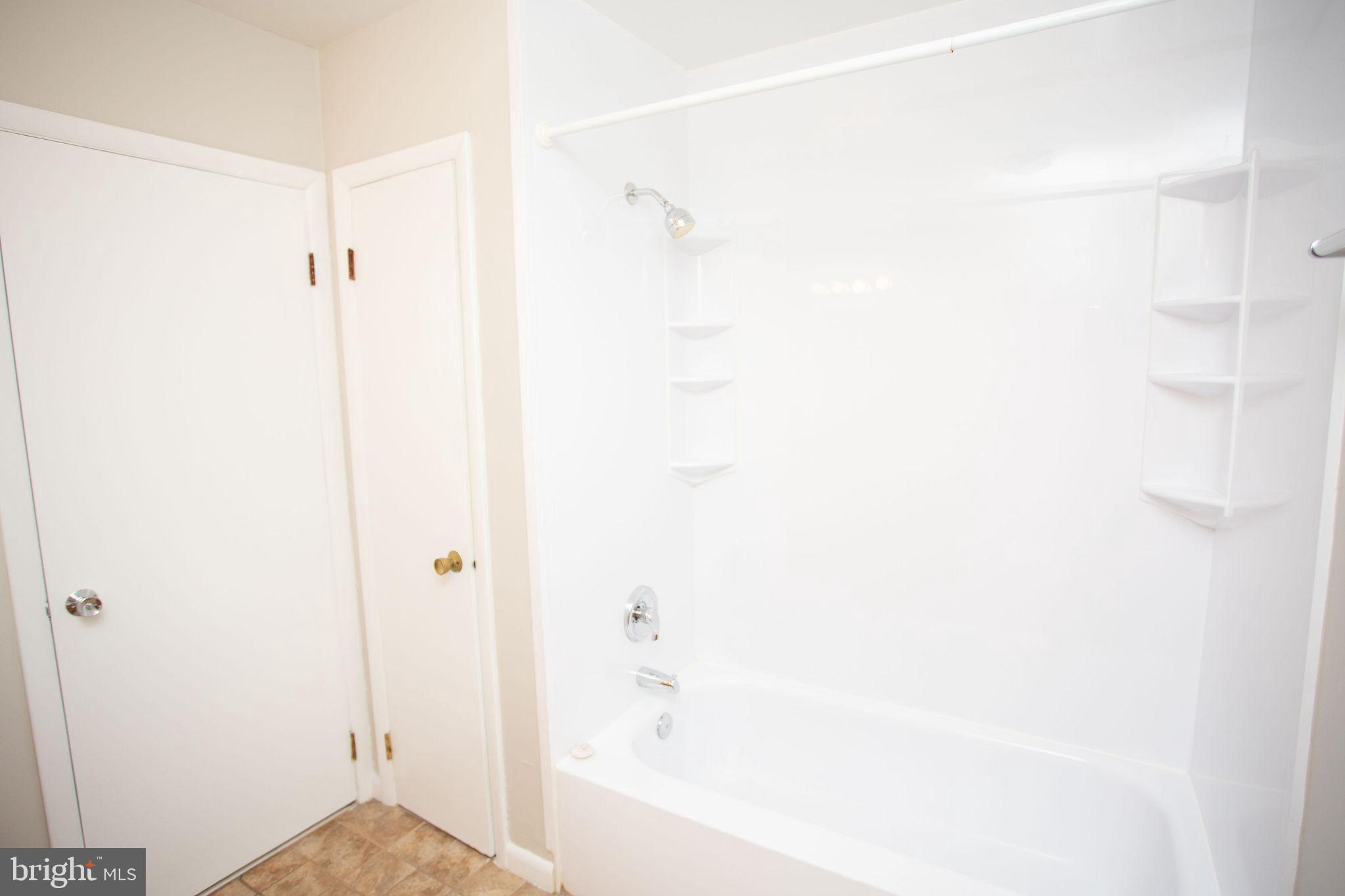 1016 Eagle Lane Cherry Hill, NJ 08003 - Photo 45 of 54 a bathroom with a shower and a bath tub