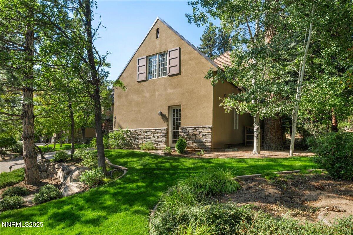 6355 Wetzel Court Reno, NV 89511 - Photo 2 of 38 a front view of a house with garden
