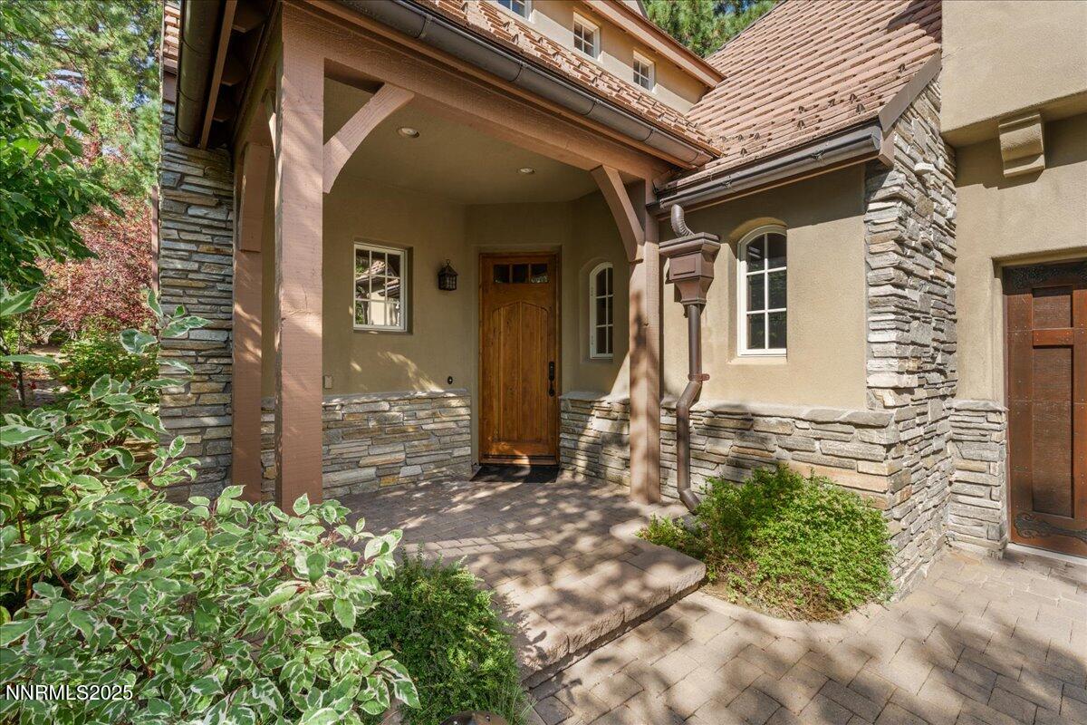 6355 Wetzel Court Reno, NV 89511 - Photo 3 of 38 a front view of a house with garden