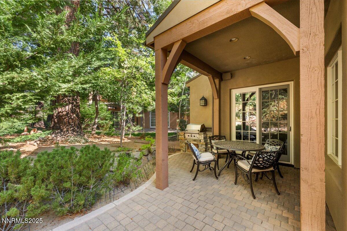 6355 Wetzel Court Reno, NV 89511 - Photo 31 of 38 a house view with a sitting space and garden space