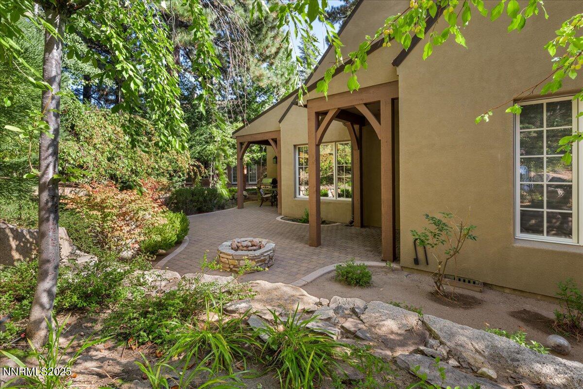 6355 Wetzel Court Reno, NV 89511 - Photo 32 of 38 a front view of a house with garden