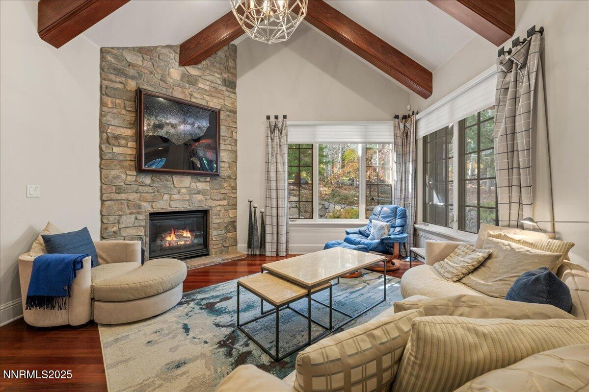 6355 Wetzel Court Reno, NV 89511 - Photo 5 of 38 a living room with furniture and a fireplace