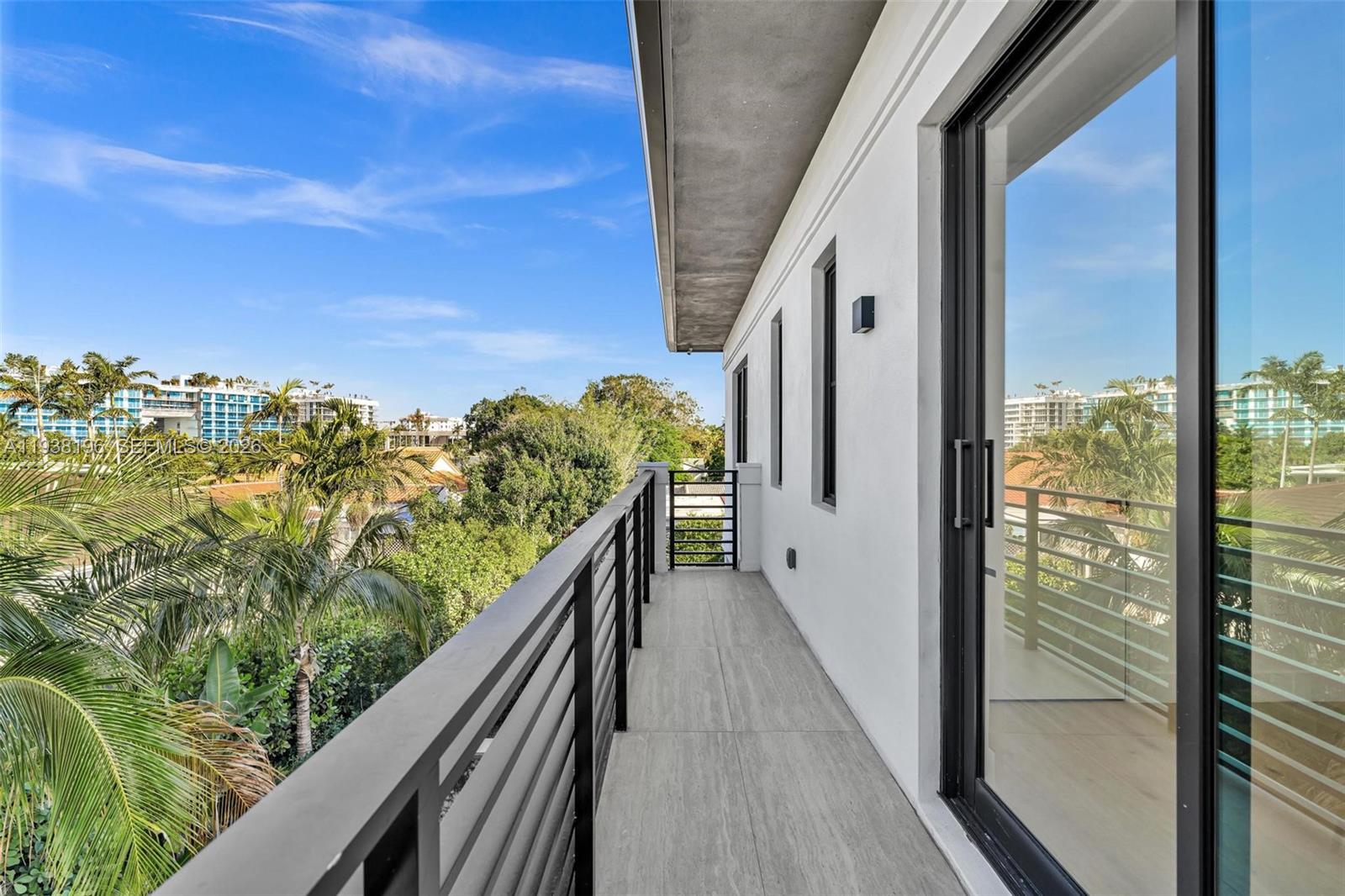 9264 Dickens Avenue Surfside, FL 33154 - Photo 19 of 46 a view of a balcony with an ocean view