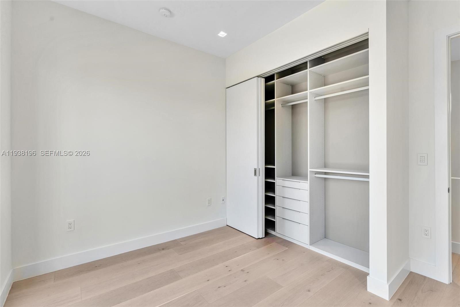9264 Dickens Avenue Surfside, FL 33154 - Photo 24 of 46 a view of an empty walk in closet