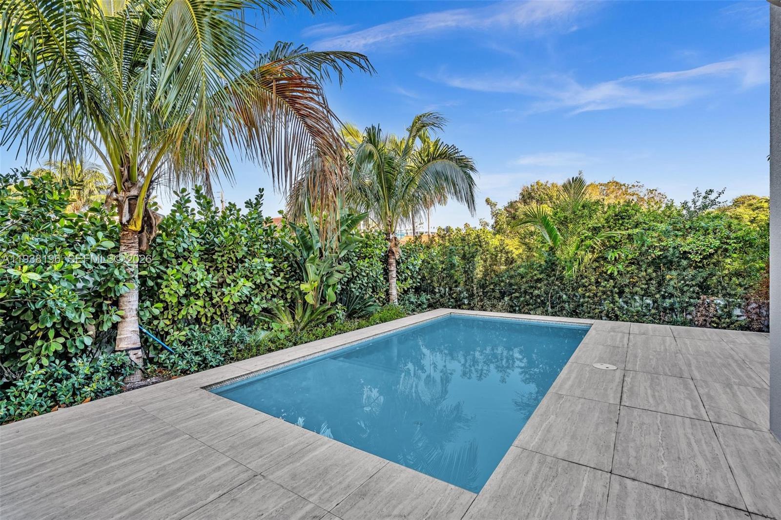 9264 Dickens Avenue Surfside, FL 33154 - Photo 43 of 46 a view of a backyard