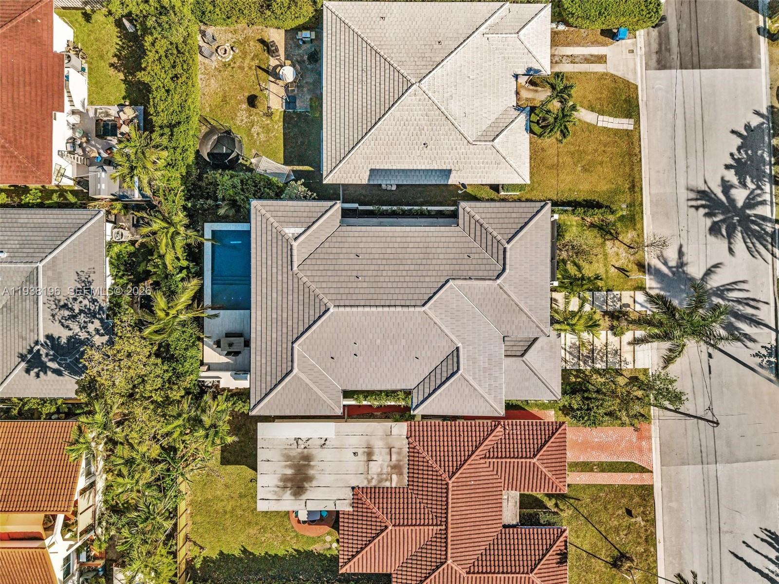 9264 Dickens Avenue Surfside, FL 33154 - Photo 44 of 46 an aerial view of a house with swimming pool