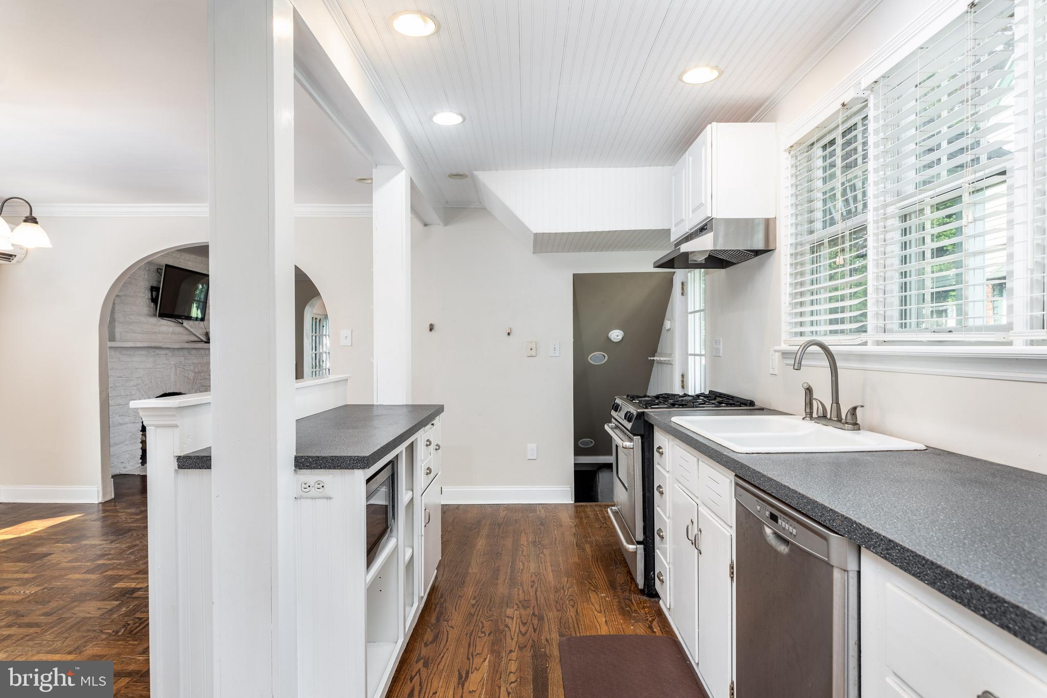 217 Rockglen Road Wynnewood, PA 19096 - Photo 13 of 17 Kitchen open to basement, side porch