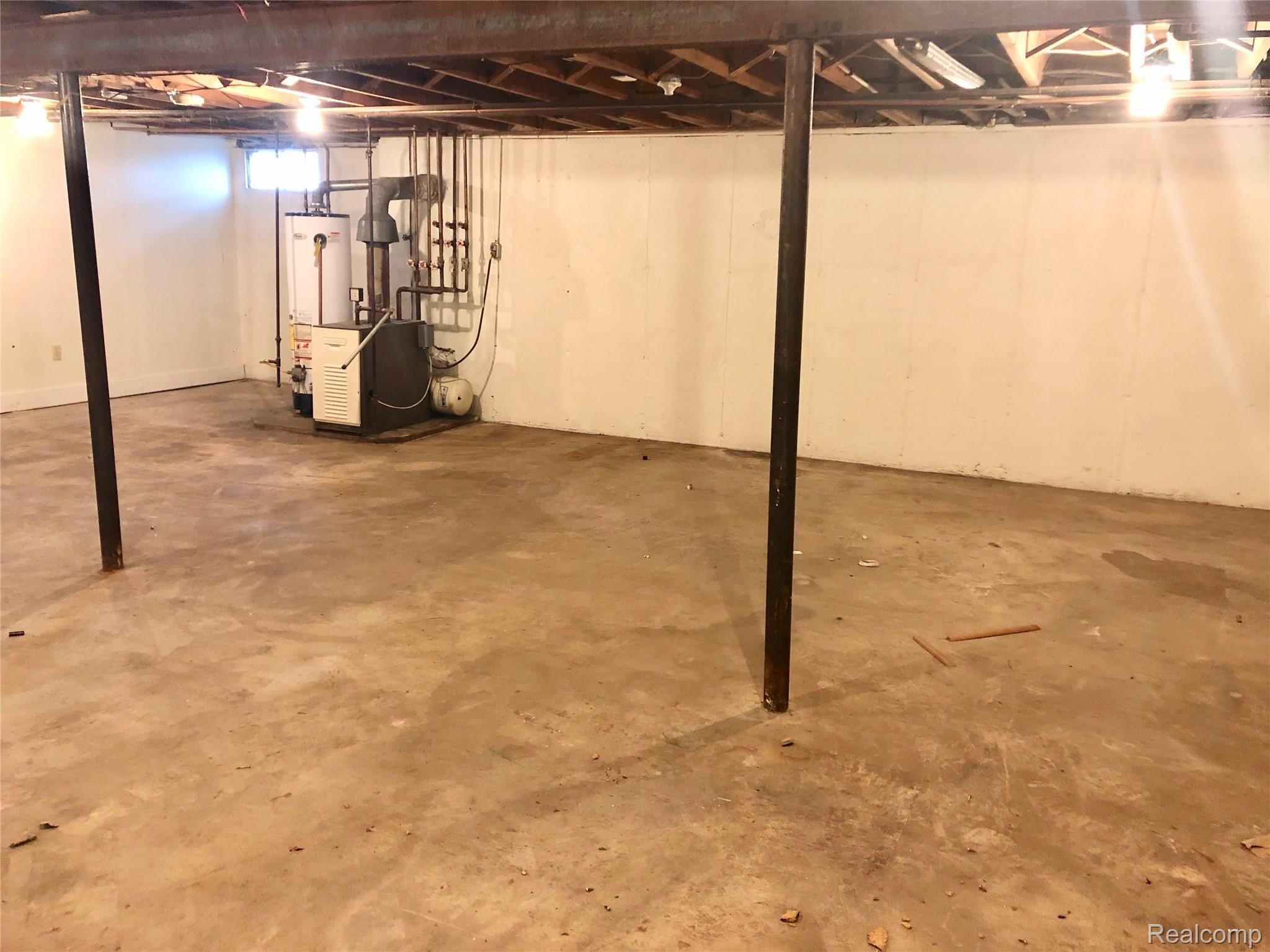 2095 Covert Road Burton, MI 48509 - Photo 31 of 38 basement with mechanicals