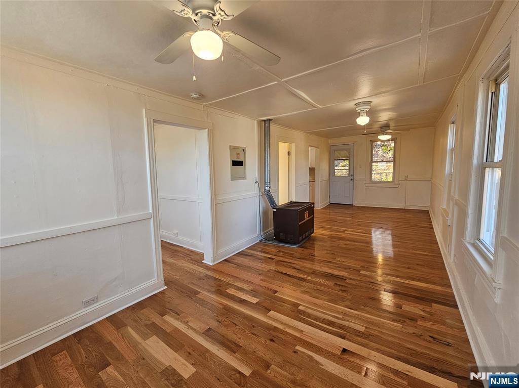 95 Cannonball Road Pompton Lakes, NJ 07442 - Photo 5 of 18 a view of a livingroom with wooden floor