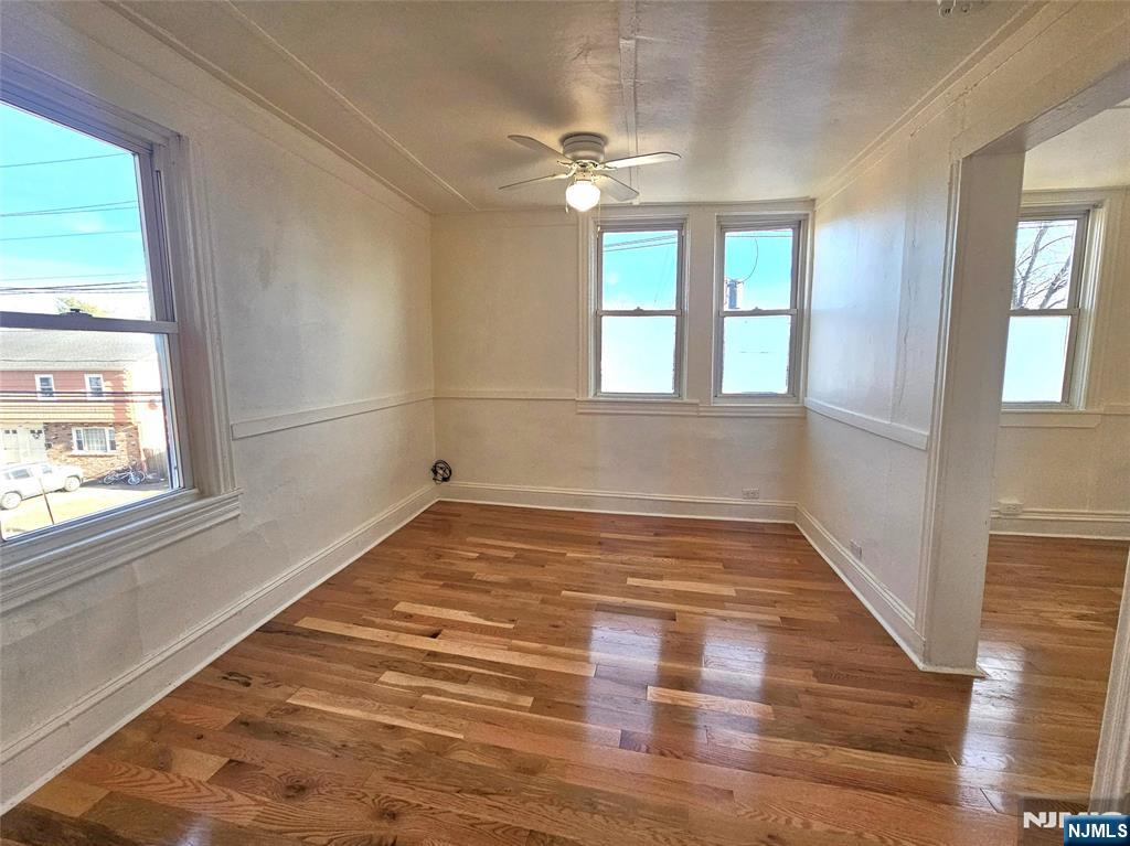 95 Cannonball Road Pompton Lakes, NJ 07442 - Photo 10 of 18 a view of an empty room with wooden floor and a window