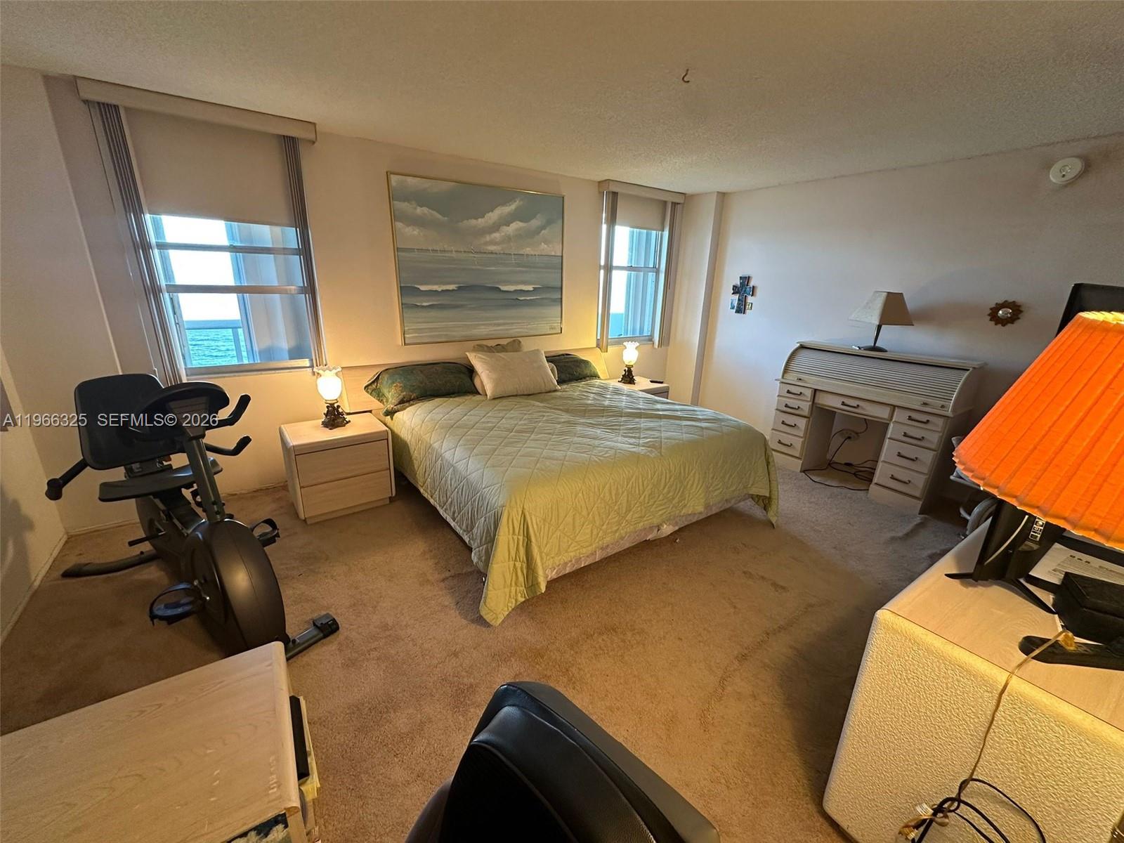 6039 Collins Avenue, Unit 1517 Miami Beach, FL 33140 - Photo 13 of 54 a bedroom with bed and window