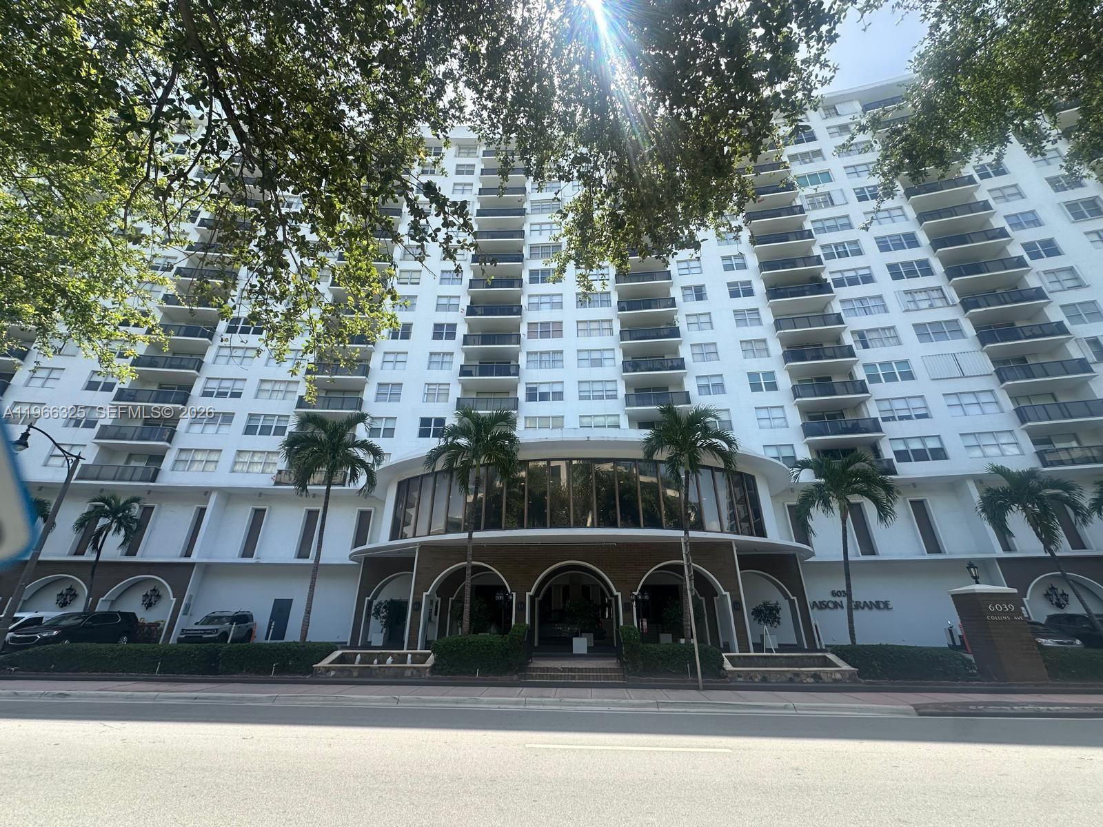 6039 Collins Avenue, Unit 1517 Miami Beach, FL 33140 - Photo 23 of 54 a view of a building with a bench