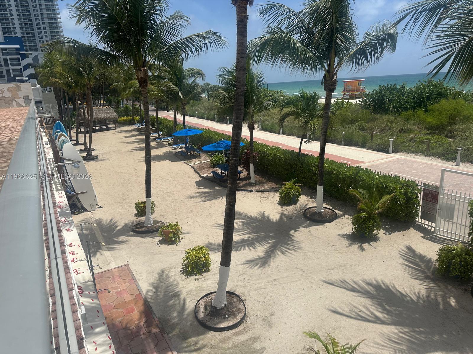 6039 Collins Avenue, Unit 1517 Miami Beach, FL 33140 - Photo 40 of 54 a view of a backyard