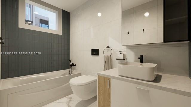 6039 Collins Avenue, Unit 1517 Miami Beach, FL 33140 - Photo 51 of 54 a bathroom with a toilet a sink and bathtub