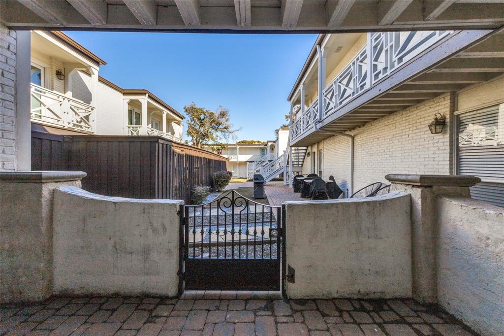 5911 East University Boulevard, Unit 104 Dallas, TX 75206 - Photo 6 of 8 a view of a balcony with furniture