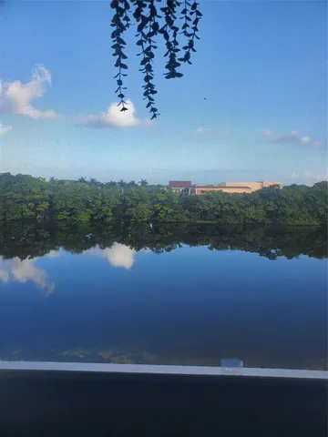an aerial view of a pool yard swimming pool and outdoor seating