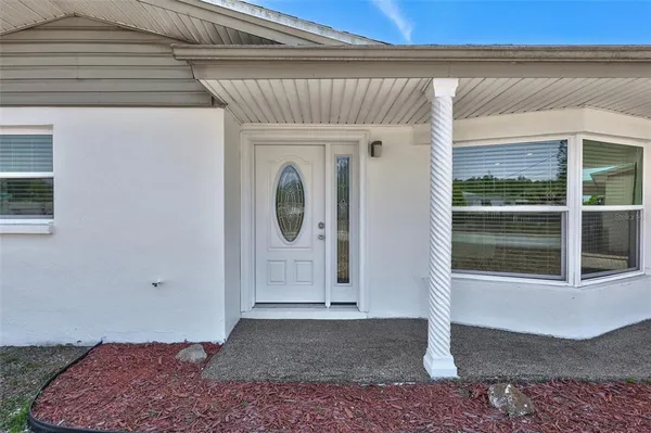 a front view of a house with entryway