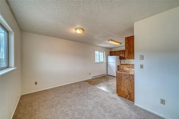 a kitchen with stainless steel appliances a refrigerator and a sink