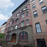 a front view of a multi story building