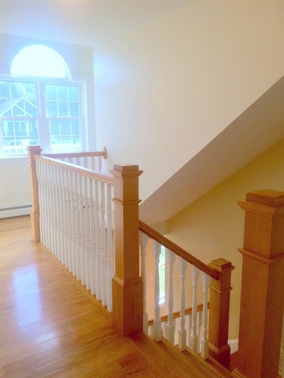 96 River's Edge Drive Portland, ME 04102 - Photo 19 of 32 Staircase wraps around to the front...