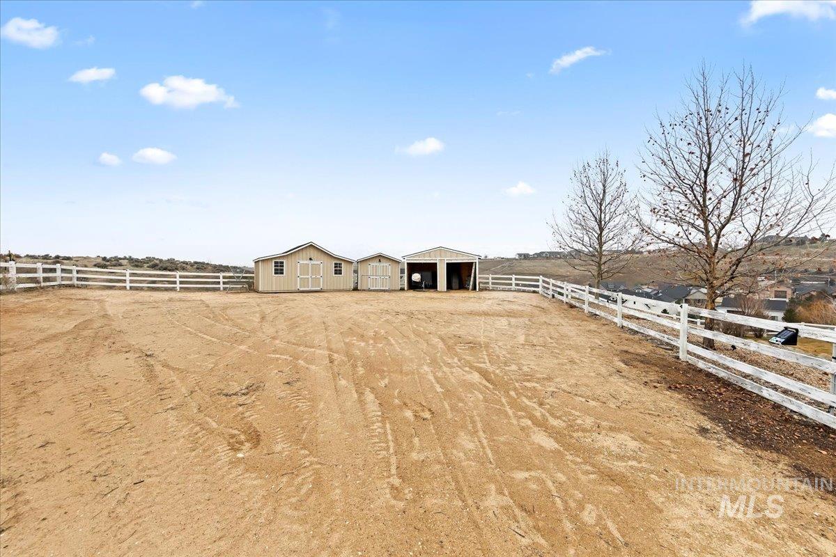 24813 Valley Run Place Star, ID 83669 - Photo 42 of 50 View of yard with an outdoor structure, a view of rural / pastoral area, and an outbuilding