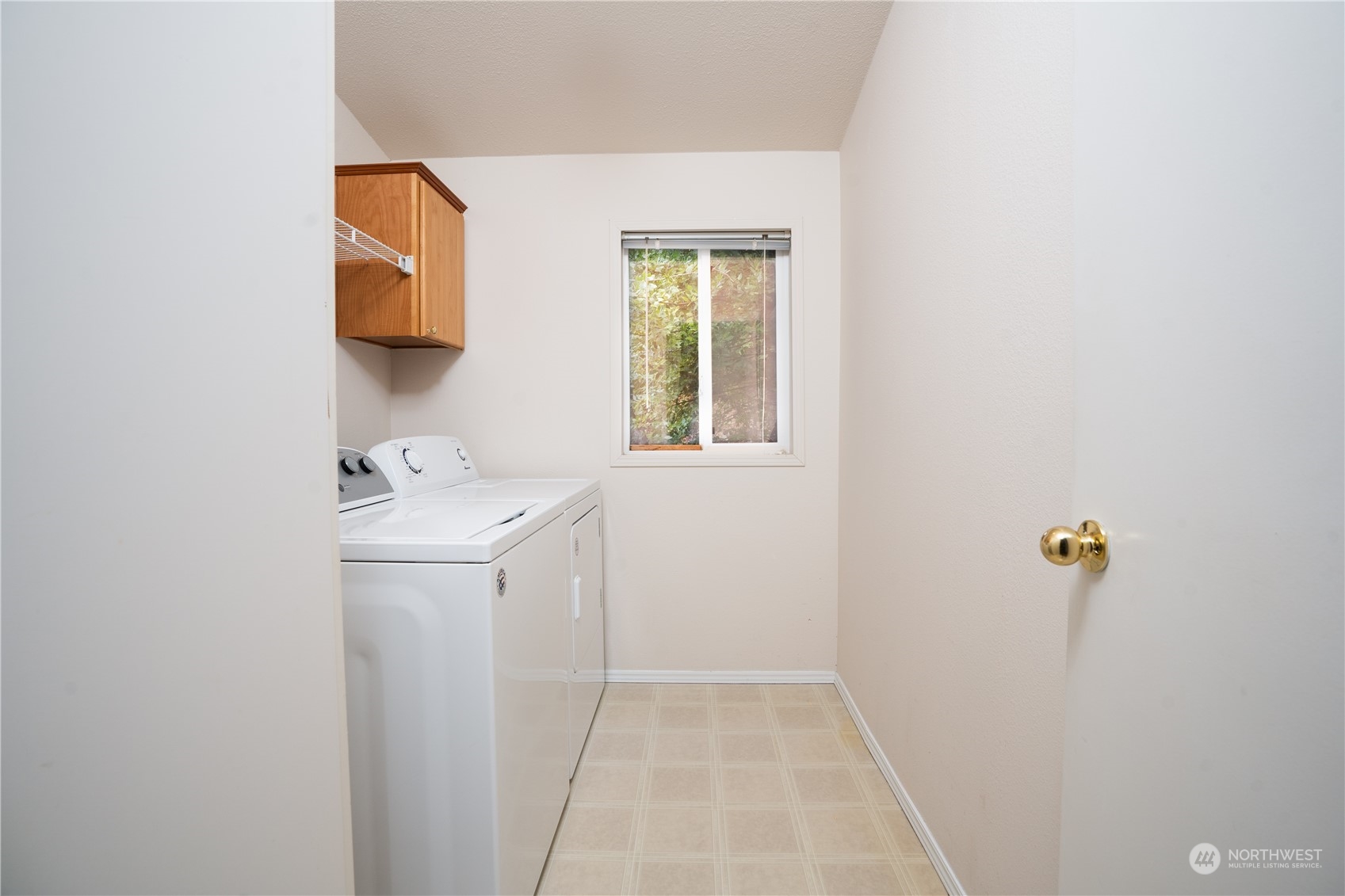 17908 Erickson Road Southwest Longbranch, WA 98351 - Photo 17 of 30 a utility room with dryer and washer
