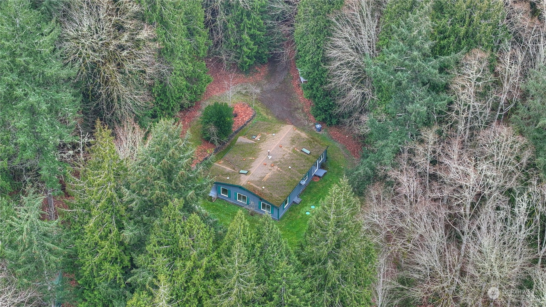 17908 Erickson Road Southwest Longbranch, WA 98351 - Photo 29 of 30 an aerial view of a house with a yard and garden