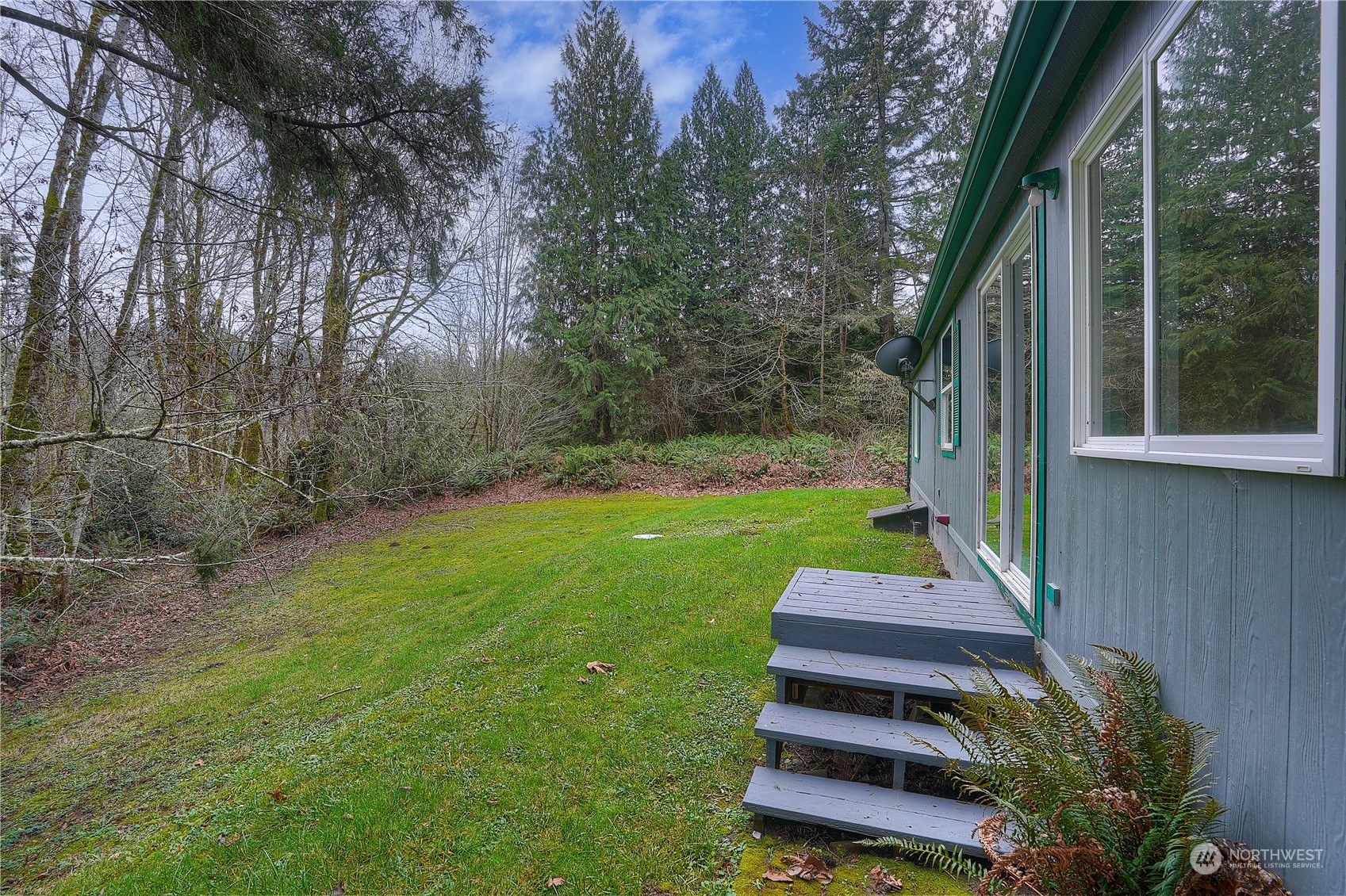 17908 Erickson Road Southwest Longbranch, WA 98351 - Photo 3 of 30 a view of a backyard with sitting area